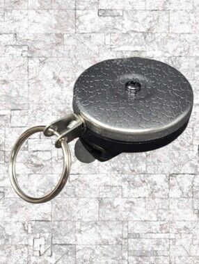 NEW- KEY-BAK ORIGINAL CHROME AND BLACK RETRACTABLE KEY HOLDER - U.S.A.